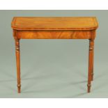 A Regency mahogany rosewood banded turnover top card table, with rounded corners,