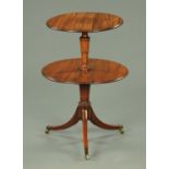 A 19th century mahogany two tier circular dumbwaiter,