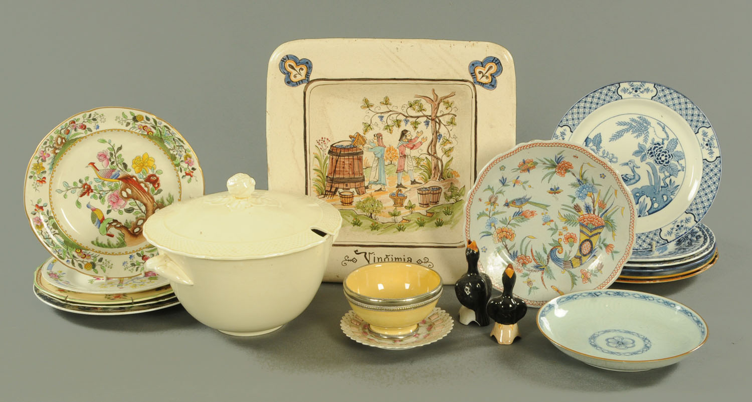 A quantity of decorative plates, a Leeds style tureen and cover and an Italian tin glazed charger.