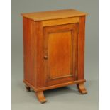 A late Victorian mahogany side cabinet, fitted with a single door with wooden knob handle.