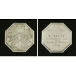 A French silver coloured metal token for The Sun Company Insurance,