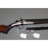 WW Greener a 32 bore single barrelled hammer shotgun, with 27" steel barrel,