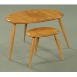 Two Ercol light elm pebble tables, largest 65 cm wide, 41 cm high.