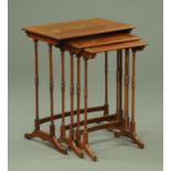 A nest of three Edwardian mahogany satinwood crossbanded tables,