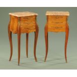 A pair of bedside cabinets,