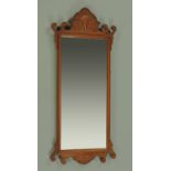 A George III style mahogany fretwork wall mirror, with applied moulding to the head. Width 44 cm.