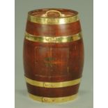 A 19th century oak coopered barrel stick stand,