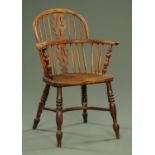 A 19th century yew wood Windsor armchair,