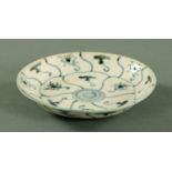 A Chinese blue and white "Tek Sing" dished plate, early 19th century,