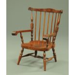 An American low stick back armchair,