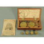 A set of steel coin scales and assorted weights, late 18th century,