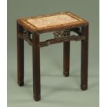 A 19th century Chinese rouge marble topped occasional table,
