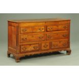 A George III oak and mahogany crossbanded Lancashire mule chest,