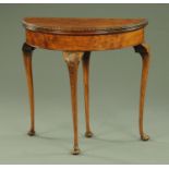 A burr walnut Queen Anne style turnover top games table,