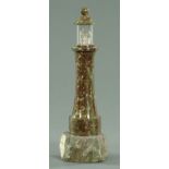 A serpentine marble table lamp in form of a lighthouse, 20th century, 35 cm high.