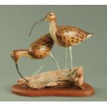 Stuart Males a carved wood figure group of two curlews,