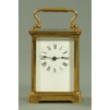 An Edwardian brass cased carriage clock, timepiece only, stamped verso "A.C.C.".