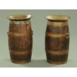 A pair of Victorian oak barrel form stick stands, brass bound.