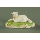 A Stevenson and Hancock Derby figure of a recumbent lamb, mid 19th century,