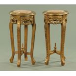 A pair of rouge marble topped painted wooden jardiniere stands,