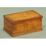 A 19th century oak table box, rectangular form with plinth base, width 34.