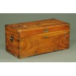 A 19th century camphorwood chest, with metal bound corners and carrying handle to either side,