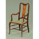 An early 20th century Arts and Crafts inspired mahogany armchair,