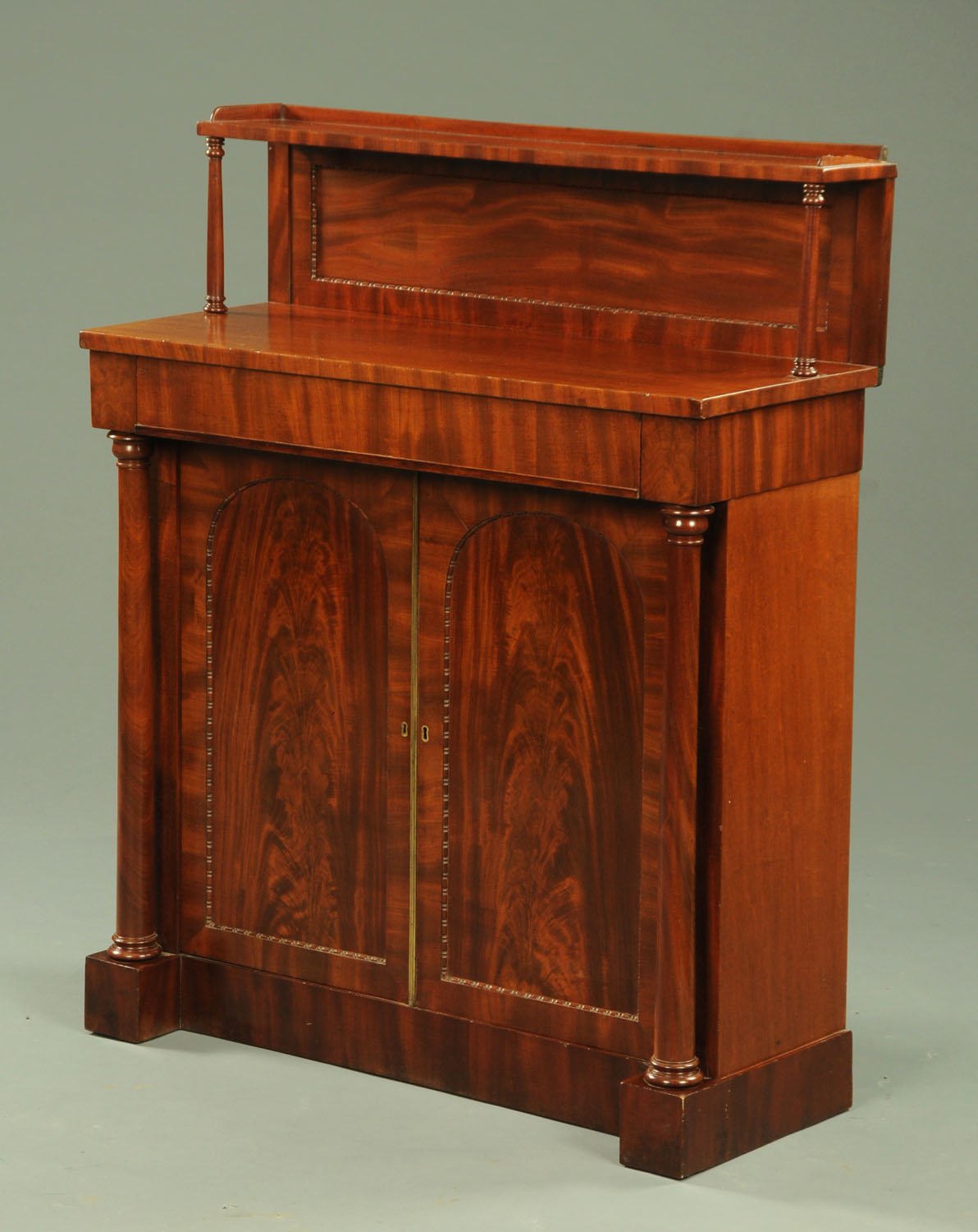 A William IV mahogany chiffonier, with rear shelved upstand,