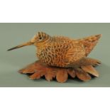 A hand carved and painted model of a woodcock, by Stewart Males,