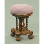 A Victorian piano stool,