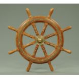 A ships wheel, from a Chinese junk. Wheel diameter excluding handles 57 cm.