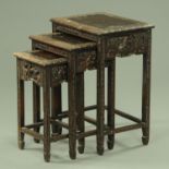 A nest of three Chinese carved Hongmu tables, early 20th century,
