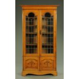 An early 20th century oak bookcase,