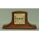 An oak cased mantle clock, circa 1930,