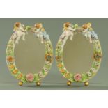 A pair of Sitzendorf attributed porcelain dressing table mirrors, 20th century,