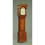 An early 19th century oak and mahogany longcase clock,