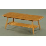 An Ercol light elm coffee table,