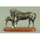 A Beswick Connoisseur series black beauty and foal, matt finish on wood plinth, 20 cm high.