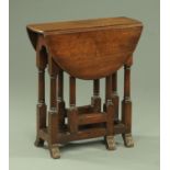 An 18th century style oak Ipswich type gate legged table, small form,