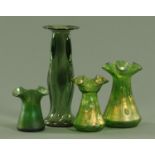 Four green glass Art Nouveau vases, attributed to Powell, each with ground pontil.