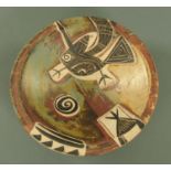An Alfajar hand thrown pottery dish, 20th century, in the style of Picasso,