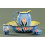 A Falcon ware toilet jug and basin set, four pieces decorated with tulips to blue ground.