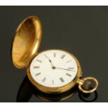 An 18 ct gold cased fob watch, full Hunter, with enamelled dial. diameter 36 mm, gross weight 43.