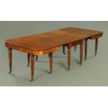 A Regency mahogany dining table in the manner of Gillows of Lancaster,