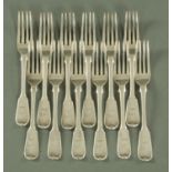 Twelve Fiddle pattern dessert forks, Benjamin Davies, London 1830, each with engraved crest,