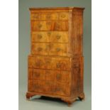 An 18th century walnut tallboy,