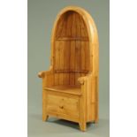 A pine barrel back porters type hall chair, fitted with a base drawer and raised on stile feet,