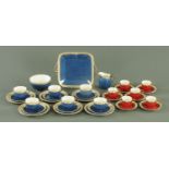A Wedgwood powder blue six place tea set, with gilt leaf and berry border, Pattern No.
