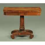 A William IV rosewood turnover top games table, with burgundy baize lined playing surface,