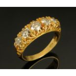 An 18 ct yellow gold diamond set half eternity ring, total diamond weight +/ 1.33 carats, size M/N.